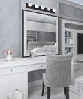 Matte Black Five Light Vanity Fixture Dimmable Bathroom Vanity Light For Makeup Area above white vanity with grey chair