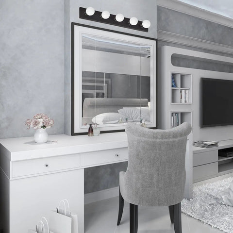 Matte Black Five Light Vanity Fixture Dimmable Bathroom Vanity Light For Makeup Area above white vanity with grey chair