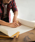 Person drawing on Heavy Duty Art Easel Paper Roll for Crafts and Painting, Kid Friendly Multiuse, 17.75 Inches Wide by 200 Feet Long.