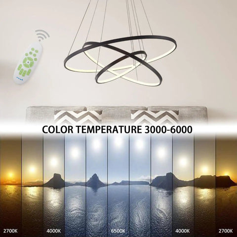 Lit Three Ring Modern LED Chandelier Pendant Light above couch showing color temperature range 3000-6000K with remote