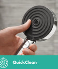 Hand holding Pulsify S Handheld Shower Head Set With 3 Spray Modes QuickClean And Hose In Chrome 2.5 GPM Flow