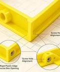 Close-up of Single Gang Outlet Box Extender One Quarter Inch Snap On Wall Plate Gap Filler showing rigid plastic edges and screw hole alignment.