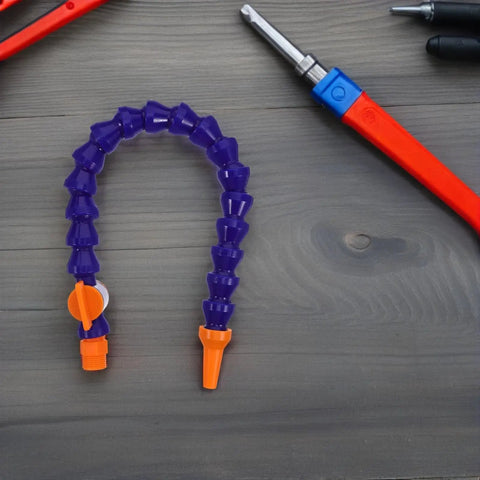 Plastic Air Hose Nozzle Fits Milling Machine Air Compressor Sick Design Cleans Dust Fast Cooling And Portable Misting System Ideal For Drill Mill Engraver Needs Airflow Keeps Gear Chill Heavy Duty Work Badass Pressure Super Solid. Flexible purple plastic air hose nozzle with orange tip and threaded base.