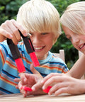 Children experimenting with Magnet Science Kit for Kids With 10 Hands On Magnetic Experiments And Games And 25 Plus Pieces
