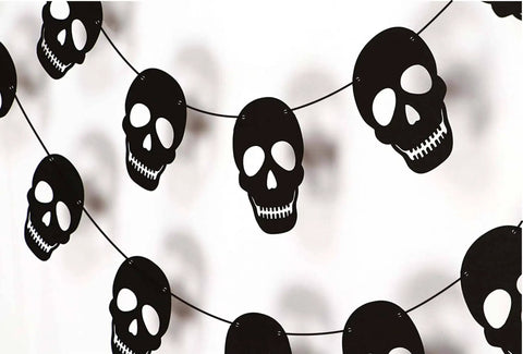 Bold Black Skull Garland Decorations For Halloween And Gothic Parties Edgy Horror Banner Decor Perfect For Haunted Houses Pirate Themed Nights Rock And Metal Venues Dark Aesthetic Events featuring 36 black skulls on cardstock.