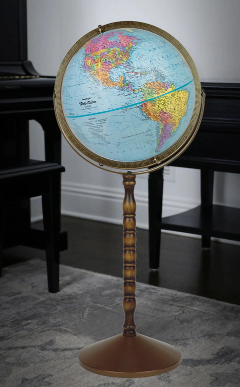Globe on turned wood stand with brass-toned metal base, 12-inch globe showing Americas.