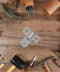 Heavy Duty Zinc Alloy Door Pivot Hinges For Glass Shower Doors With Silver Finish Easy Install Bidirectional Swing Secure And Stable Ideal For Bathroom And Home Use shown on a wooden background with tools.