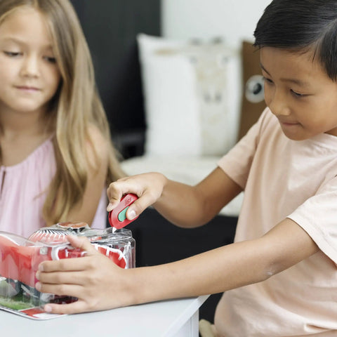Child using Mini Ceramic Box Cutter With Manual Retracting Safe Finger Friendly Ceramic Blade Lasts 11x Longer Than Metal Box Opener