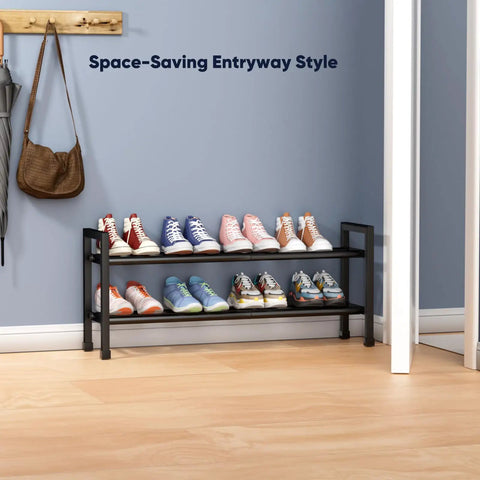 Two Tier Expandable Shoe Rack That Grows From 17 To 33 Inches, holding sneakers, in a hallway setting against a blue wall.