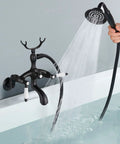 Clawfoot Tub Faucet Matte Black with Handheld Shower, wall mount tub filler, dual outlet, in use, solid brass.