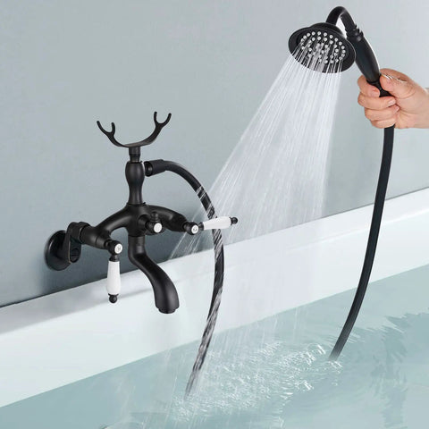Clawfoot Tub Faucet Matte Black with Handheld Shower, wall mount tub filler, dual outlet, in use, solid brass.
