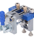 Self Centering Dowel Jig Kit With Adjustable Drill Guide and Six Heavy Duty Bushings Plus Three Carbide Bits, silver and blue.