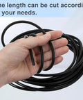 16.4 Ft Black Silicone Vacuum Hose 1/8 Inch Internal Diameter 3 mm And 3/16 Inch Outer Diameter 5 mm High Temperature Vacuum Tubing For Automotive And Industrial Applications held in hand