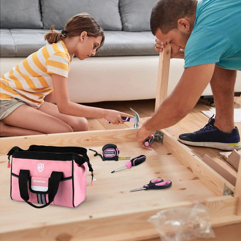 Child and adult using 9 Piece Kids Real Hand Tool Set Pink Junior Tool Kit With Storage Bag for woodworking on wooden project.