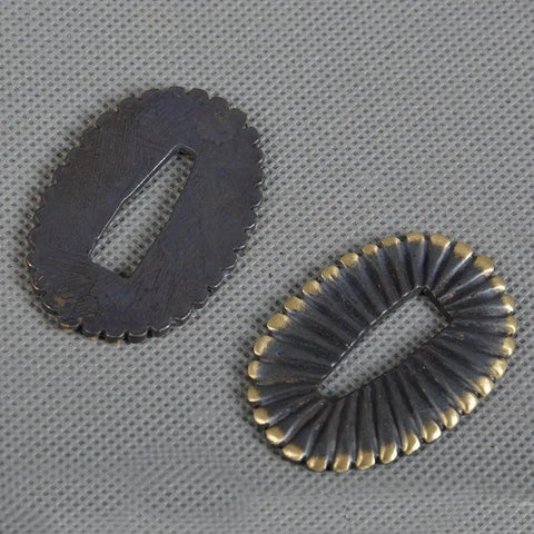 Two Piece Brass Seppa Spacer Set For Japanese Samurai Swords Replacement shown on textured background