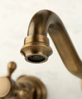 Antique Brass Bathroom Sink Faucet Set With Ceramic Disc Valve, close-up of tarnish-resistant spout and handle