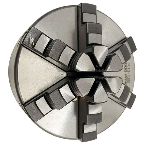 Front view of a 125mm six-jaw self-centering metal lathe chuck for CNC machine tools.
