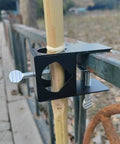 Go To Pole Holder Deck Mount Clamp Set For Tiki Torches And Mounting Poles On Porch Table Deck Or Fence Four Pack Heavy Duty Outdoor Clips For Lighting Bird Feeders And Flags installed on fence with pole