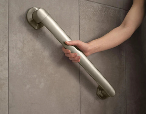 Genta Brushed Nickel 18 Inch Bathroom Grab Bar ADA Compliant with Non Slip Grip Pad 1.25 Inch Diameter Spot Resist Finish in use