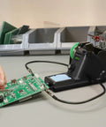 Pro Grade 60W Digital Soldering Station Kit With Two Handy Helping Hands Six Extra Tips Lead Free Solder in use on circuit board