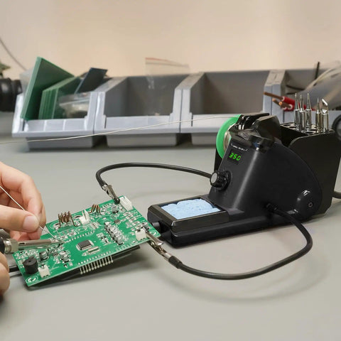 Pro Grade 60W Digital Soldering Station Kit With Two Handy Helping Hands Six Extra Tips Lead Free Solder in use on circuit board