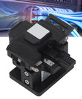 This Sleek Optical Fiber Cleaver Delivers Insanely Precise Cuts With A Tight 0.5 Degree Angle Perfect For Reliable Cold Splicing And Hot Melting Jobs On Site Featuring An Auto Blade Return Mechanism Plus Smart Portability Design To Get Your Fiber Cable, showing black handheld cleaver for optic fiber cutting.