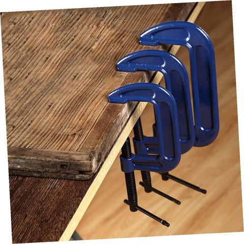 Beefy Heavy Duty 6-Inch G Clamps for Woodworking and Metalworking, quick-release table mount C-Clamps in use on wooden desk.