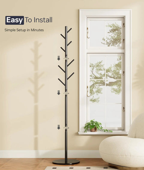 Heavy-Duty Metal Coat Rack With Eight Hooks, Three Adjustable Heights, Modern Hall Tree in room next to window, Black.