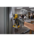 Person using Quiet 20V Max Quarter Inch Hydraulic Cordless Impact Driver With Brushless Motor LED Halo Ring XR Extreme Runtime Tool Only