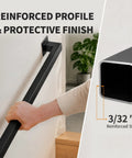 Hella Sturdy Indoor Stair Handrail 9 FT Modern Wrought Iron Railing With Dope Matte Black Powder Coated Finish Reinforced Square Design For Farmhouse Decor showing reinforced profile and hand gripping.