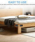 Heavy Duty Black Flat Metal Brackets For Wood Repair Set With Included Screws attached to bed frame for easier installation.