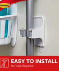 Smooth Broom And Mop Gripper Organizer with adhesive strips on wall holding a pole, damage-free and easy installation.