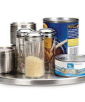Slick Brushed Stainless Steel Lazy Susan Turntable displaying spice jars and tins, 10.5 inches wide for pantry organization.