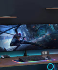 Heavy Duty Aluminum Ultrawide Monitor Desk Mount And Adjustable Monitor Arm For Wide Screens Up To 57 Inches showcasing a vibrant gaming setup.