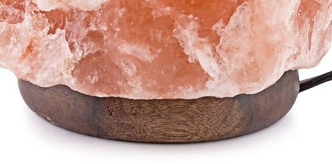 Dimmable Pink Himalayan Salt Lamp With Handcrafted Wooden Base, close-up of natural crystal glow on wooden base.