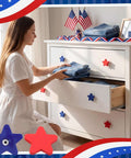 Woman using Patriotic Star Cabinet Knob Set 12 Piece Red And Blue Silicone Drawer Knobs For Kitchen Decor 4th Of July Party Decor
