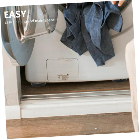 Four Pack Anti Skid Washing Machine Pads And Stabilizer Feet For Vibration Control visible under a washing machine on a hardwood floor