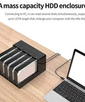 Usb 3.0 Hdd Docking Station And Sata Hard Drive Enclosure Case on wood desk connecting to laptop with multiple drives.