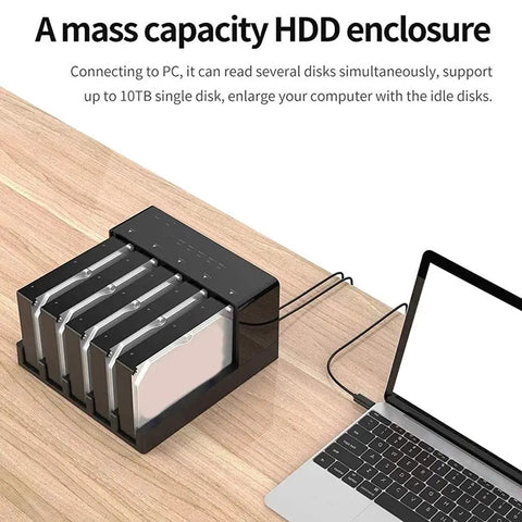 Usb 3.0 Hdd Docking Station And Sata Hard Drive Enclosure Case on wood desk connecting to laptop with multiple drives.