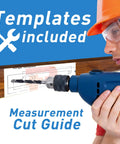 Worker using a drill on a wood board with template and measurement guide visible, wearing safety gear and orange helmet.