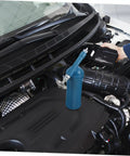 Portable 80cc Grease Gun With Precision Nozzle For Excavators, Cars, And Industrial Equipment in use on a car engine
