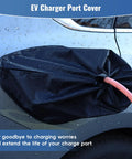 Dang Solid Magnetic EV Charger Cover For Steel Body Electric Cars All Weather Shield over charging port on a vehicle in rain.