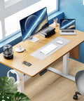 Solid Height Adjustable Standing Office Desk With Ergonomic Sit Stand Workstation And Thick Mdf Top Designed To Take The Stress Out Of Your Daily Grind Smoothly, featuring a wooden top, dual monitors, and ergonomic chair.
