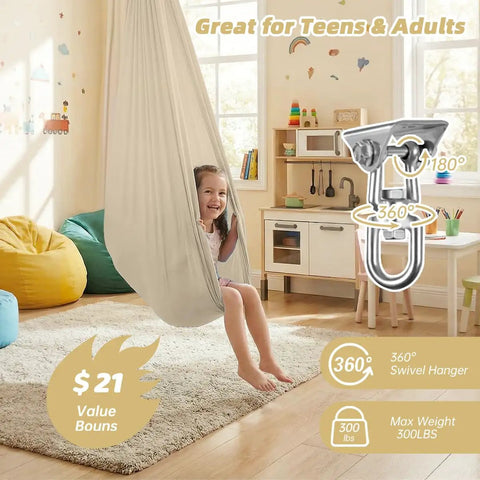 Kid Friendly Sensory Swing For Indoor And Outdoor Use 300 Lb Weight Capacity Hanging Therapy Swing With 360 Degree Swivel Hanger Kit Calming Effect For Autism ADHD SPD Beige showing child in playroom