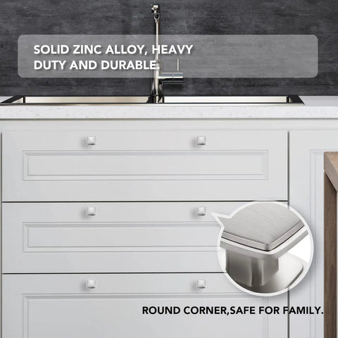 Sturdy Zinc Alloy Brushed Nickel Cabinet Knobs, 25 Pack, featured on white kitchen drawers, anti-rust finish, close-up detail