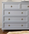 Solid Brass Cabinet Ring Pulls Six Pack installed on a vintage dresser, showcasing antique circle drawer pulls with large rings for easy grip.