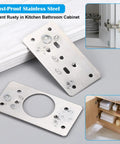 12 Pack Stainless Steel Cabinet Hinge Repair Kit With Door Hinge Repair Plates on a kitchen countertop, close-up view.