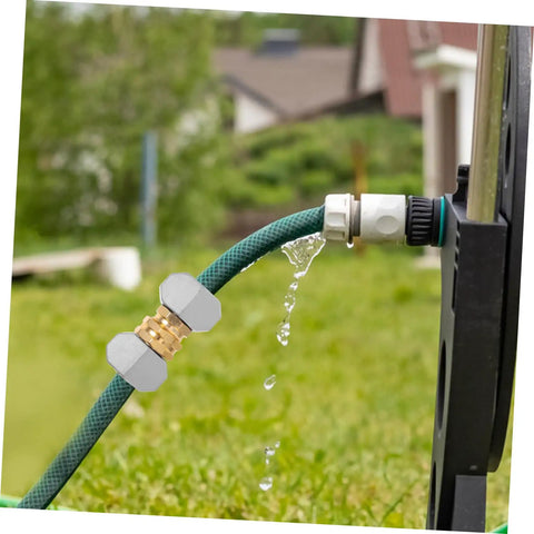 Heavy Duty Garden Hose Repair Kit Connectors For Quick Fixes And No Leak Seals, shown repairing green hose, on lawn