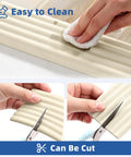 Person cleaning Game Changing Baby Edge Protectors And Corner Guards Super Wide High Density Foam Furniture Bumper Shields.