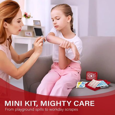 Mother applying bandage from Grab And Go Pocket First Aid Kit With A Compact Hard Shell Case And 50 Essentials Per Pack For A Total Of 600 Medical Items In 12 Packs